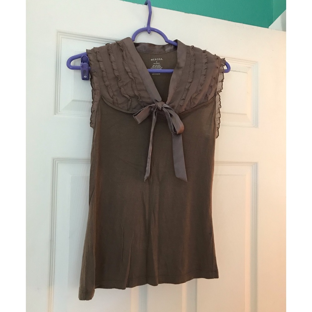 Ruffles and bow sleeveless top